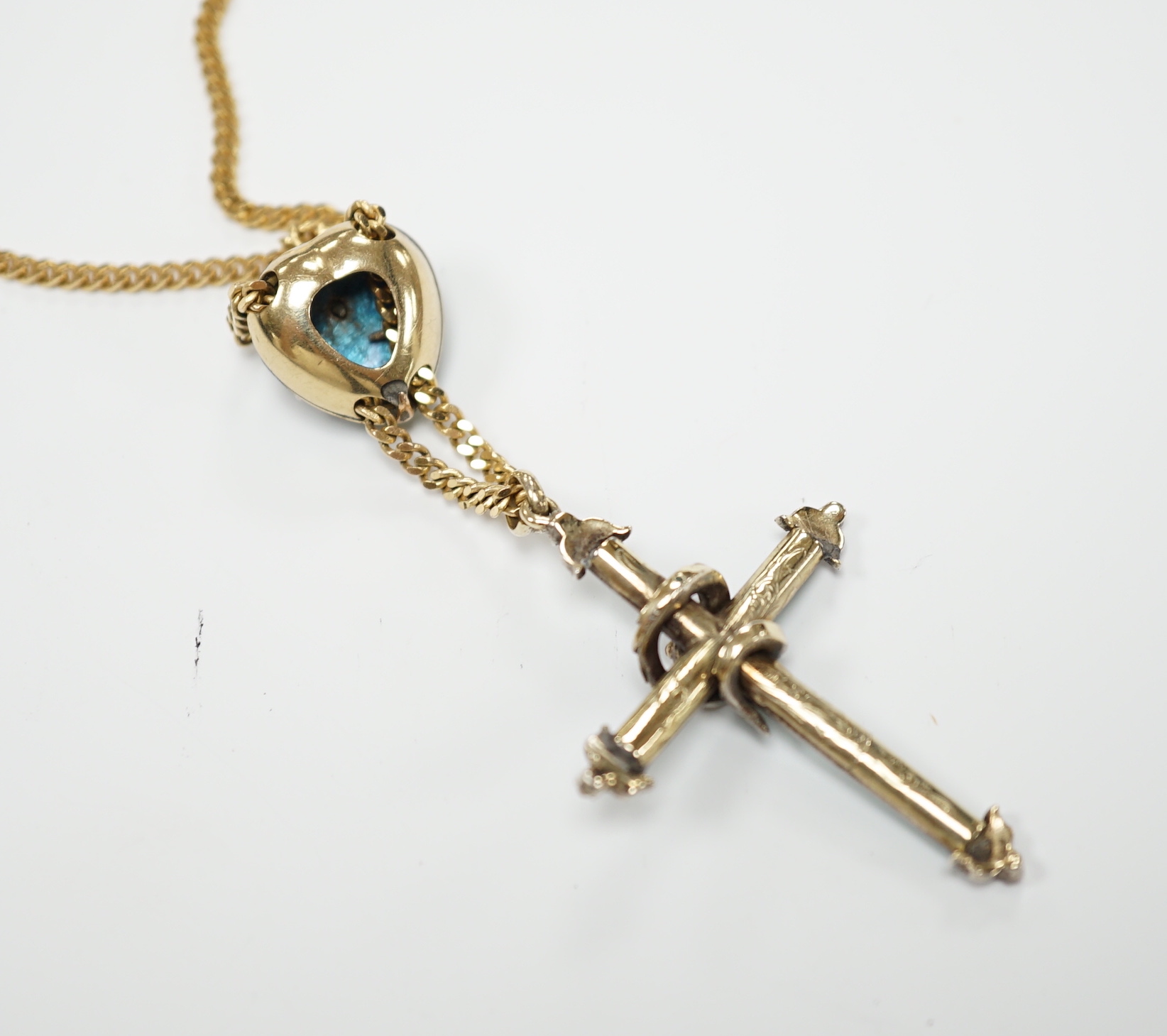 A 19th century yellow metal, green enamel and rose cut diamond set cross pendant, with entwined serpent and heart shaped slider, now on a later Italian 9ct gold chain, overall 58cm, gross weight 16.5 grams.